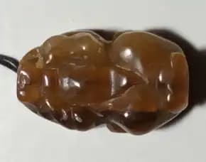 Liontin Dari Batu Bulu Macan